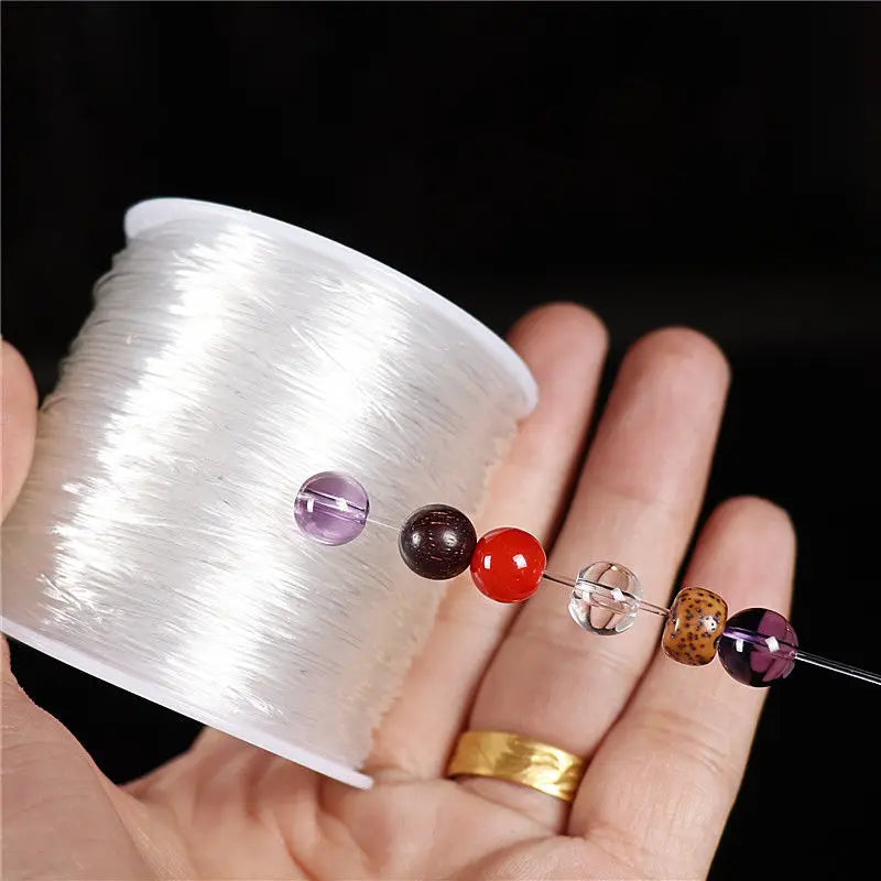 100m/Roll Elastic Crystal Jewelry Cord Beading String Strong Stretchy Thread Cords for DIY Necklace Bracelet Jewelry Making SuperFye 0.6mmX100m SuperFye